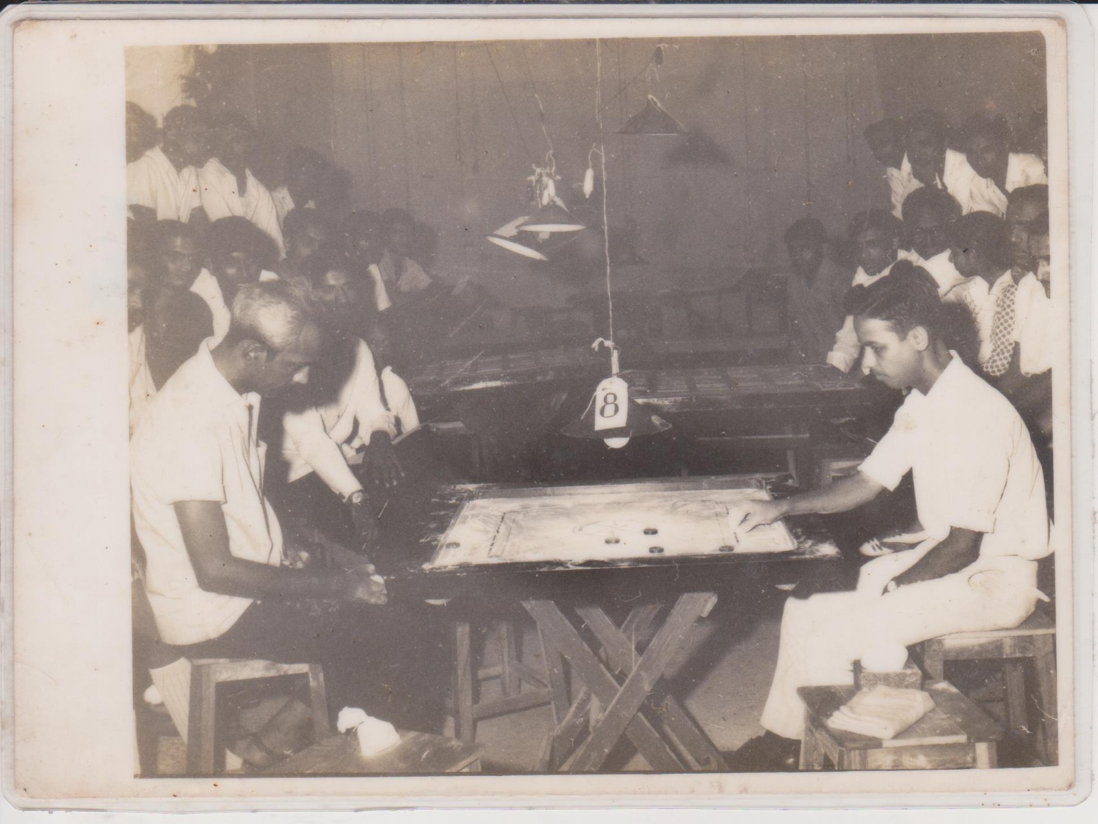 Championship match watched by a packed room